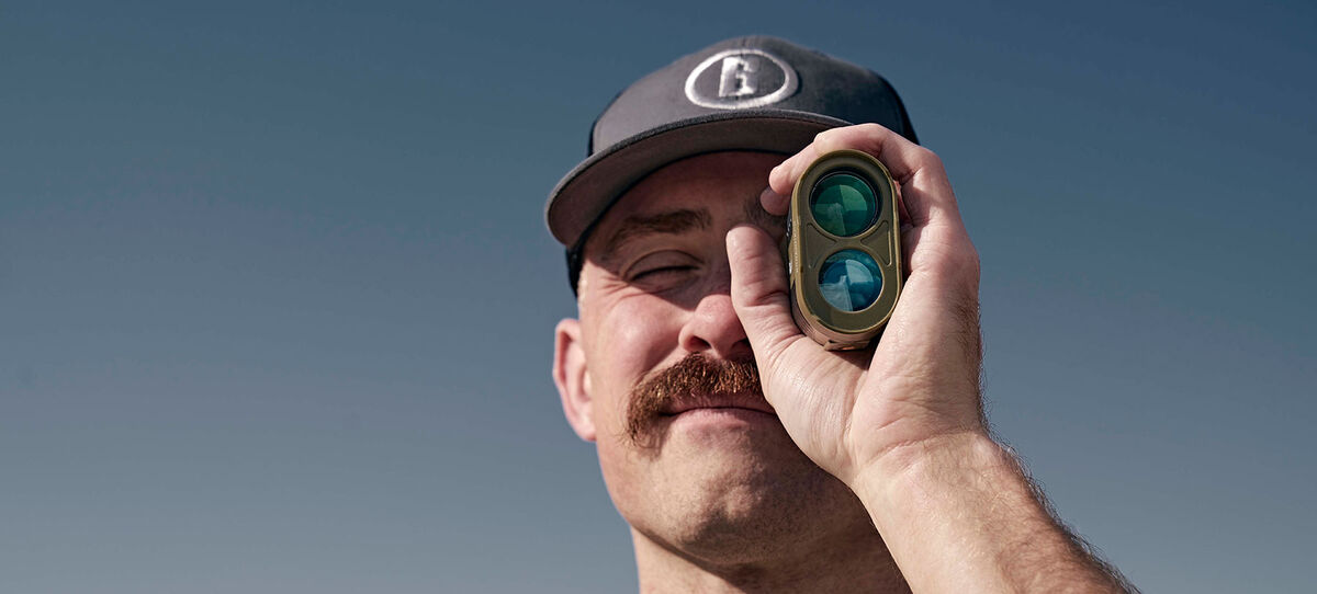 Man looking through a LRF