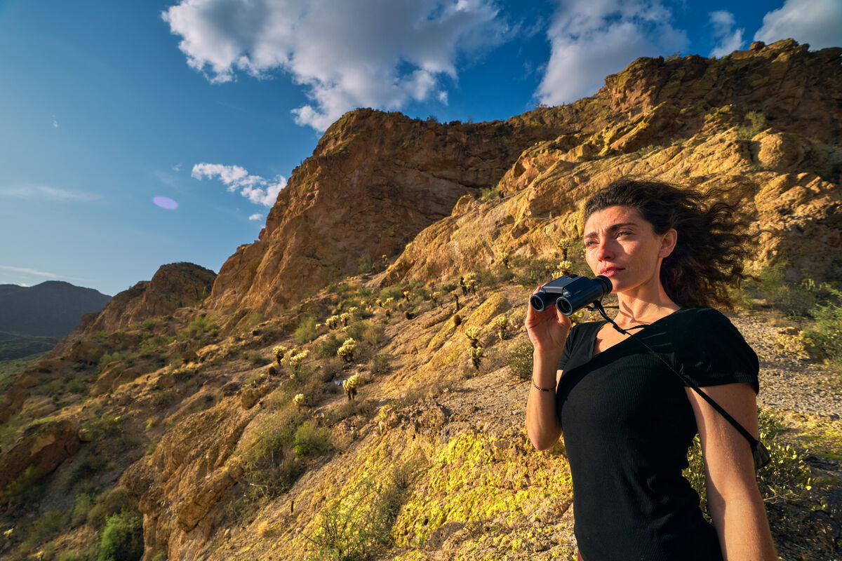 Man holding up Binos